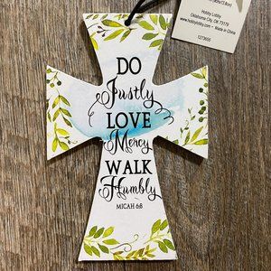 Decorative wood hanging cross.